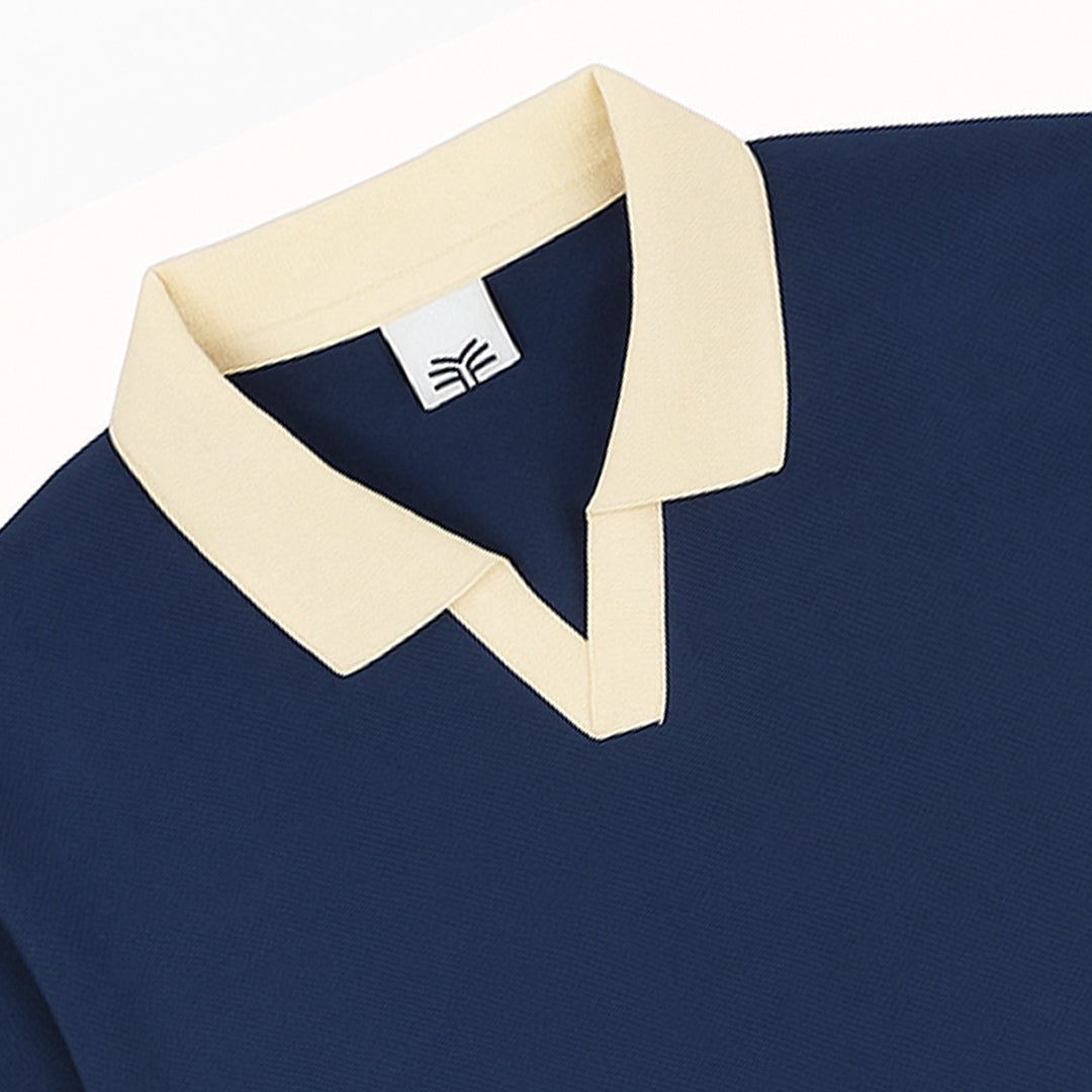 Navy blue polo shirt-cream - coloured V-neck collar